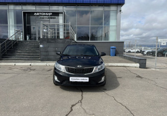 Подержанный автомобиль Kia Rio Sedan 2014 года (2 фото)
