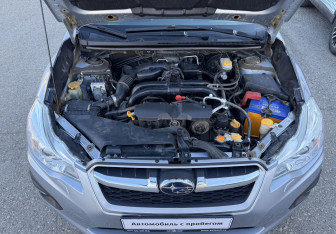 Подержанный автомобиль Subaru Impreza Sedan 2012 года (14 фото)