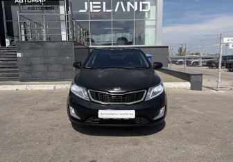 Подержанный автомобиль Kia Rio Sedan 2014 года (2 фото)