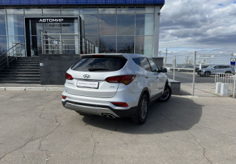 Подержанный автомобиль Hyundai Santa Fe 2015 года (5 фото)
