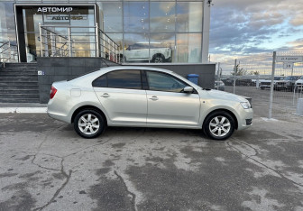 Подержанный автомобиль Skoda Rapid Wagon 2014 года (4 фото)