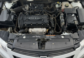 Подержанный автомобиль Chevrolet Cruze Hatchback 2013 года (14 фото)