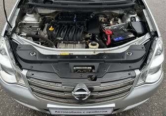 Подержанный автомобиль Nissan Almera Sedan 2014 года (14 фото)