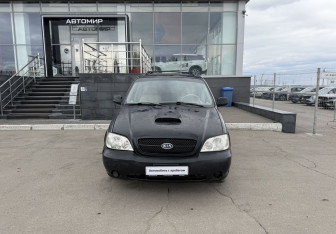 Подержанный автомобиль Kia Carnival 2004 года (2 фото)
