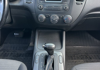 Подержанный автомобиль Kia Cerato Sedan 2013 года (11 фото)