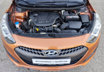 Подержанный автомобиль Hyundai i30 Hatchback 2015 года (13 фото)