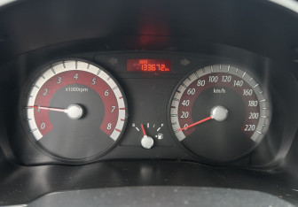 Подержанный автомобиль Kia Rio Hatchback 2010 года (9 фото)