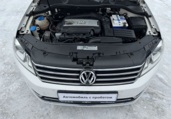 Подержанный автомобиль Volkswagen Passat Sedan 2012 года (13 фото)