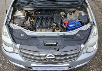 Подержанный автомобиль Nissan Almera Sedan 2014 года (14 фото)