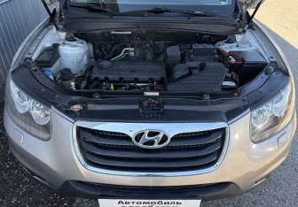 Подержанный автомобиль Hyundai Santa Fe 2010 года (13 фото)