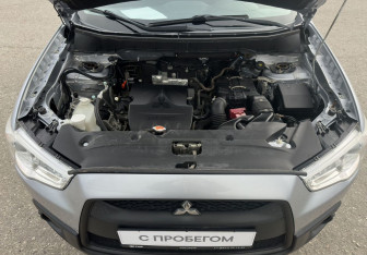 Подержанный автомобиль Mitsubishi ASX 2011 года (13 фото)