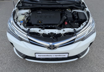 Подержанный автомобиль Toyota Corolla Sedan 2017 года (13 фото)