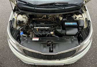 Подержанный автомобиль Kia Rio Sedan 2012 года (14 фото)