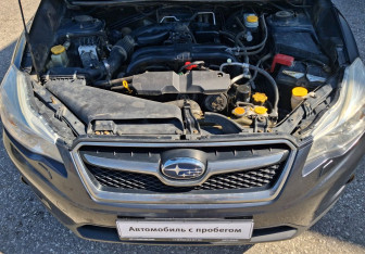 Подержанный автомобиль Subaru XV 2011 года (13 фото)