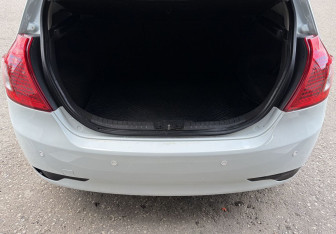 Подержанный автомобиль Kia Ceed Hatchback 2011 года (15 фото)