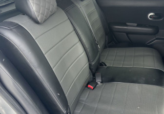 Подержанный автомобиль Nissan Tiida Hatchback 2013 года (12 фото)