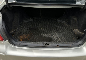 Подержанный автомобиль Toyota Avensis Sedan 2004 года (15 фото)