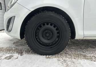 Подержанный автомобиль Opel Corsa 2013 года (14 фото)