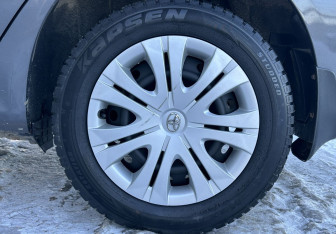 Подержанный автомобиль Toyota Corolla Sedan 2012 года (14 фото)