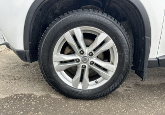 Подержанный автомобиль Nissan X-Trail 2014 года (14 фото)