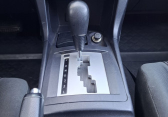 Подержанный автомобиль Mitsubishi Lancer Sedan 2012 года (11 фото)