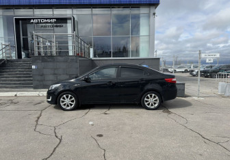 Подержанный автомобиль Kia Rio Sedan 2014 года (8 фото)