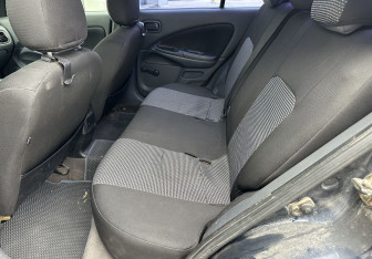 Подержанный автомобиль Nissan Almera Sedan 2005 года (12 фото)