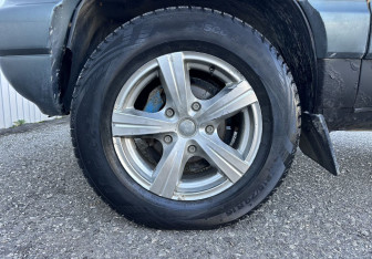 Подержанный автомобиль Chevrolet Niva 2008 года (14 фото)