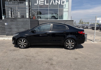 Подержанный автомобиль Kia Rio Sedan 2014 года (8 фото)