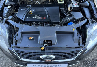 Подержанный автомобиль Ford Mondeo Sedan 2010 года (13 фото)