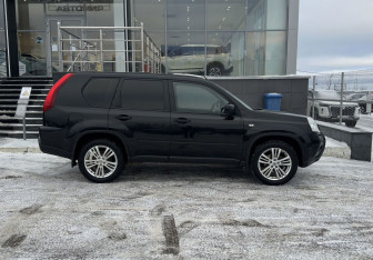 Подержанный автомобиль Nissan X-Trail 2013 года (4 фото)