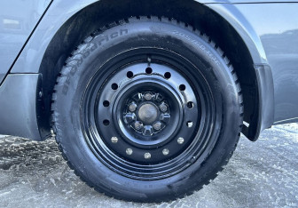 Подержанный автомобиль Nissan Primera Sedan 2006 года (14 фото)