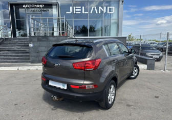 Подержанный автомобиль Kia Sportage 2014 года (5 фото)
