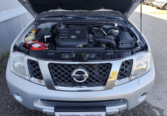 Подержанный автомобиль Nissan Pathfinder 2013 года (14 фото)