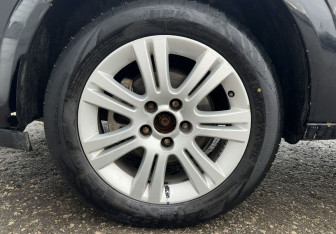 Подержанный автомобиль Opel Astra Sedan 2010 года (15 фото)