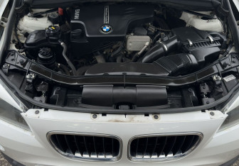 Подержанный автомобиль BMW X1 2012 года (13 фото)
