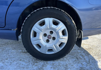 Подержанный автомобиль Fiat Albea 2010 года (14 фото)