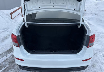 Подержанный автомобиль Kia Rio Sedan 2015 года (13 фото)