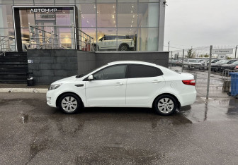 Подержанный автомобиль Kia Rio Sedan 2012 года (8 фото)