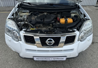 Подержанный автомобиль Nissan X-Trail 2014 года (13 фото)