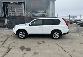 Подержанный автомобиль Nissan X-Trail 2014 года (8 фото)