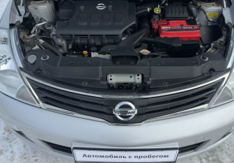 Подержанный автомобиль Nissan Tiida Hatchback 2013 года (14 фото)