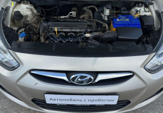 Подержанный автомобиль Hyundai Solaris Sedan 2011 года (13 фото)