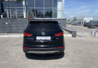Подержанный автомобиль Hyundai Santa Fe 2014 года (6 фото)