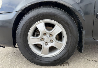 Подержанный автомобиль Kia Carnival 2004 года (16 фото)