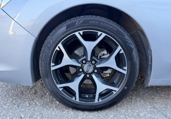 Подержанный автомобиль Subaru Impreza Sedan 2012 года (15 фото)
