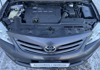 Подержанный автомобиль Toyota Corolla Sedan 2012 года (13 фото)