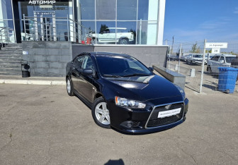 Подержанный автомобиль Mitsubishi Lancer Sedan 2012 года (3 фото)