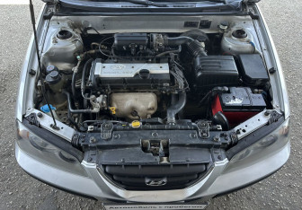 Подержанный автомобиль Hyundai Elantra Sedan 2005 года (13 фото)