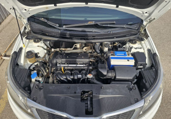 Подержанный автомобиль Kia Rio Sedan 2013 года (14 фото)